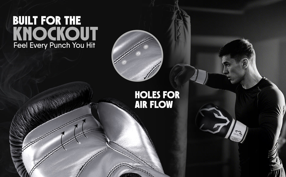 Black and white Alpha Pro boxing gloves featuring airflow ventilation holes to keep hands cool and comfortable during intense boxing, sparring, fitness training, and combat sports workouts.