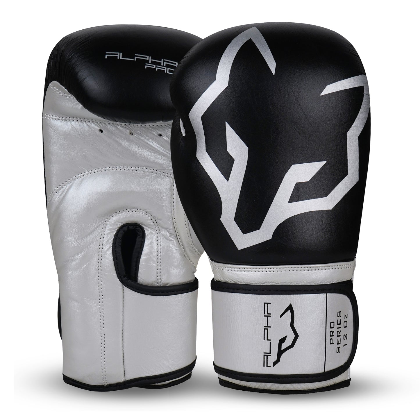 Alpha Pro genuine leather boxing gloves in black and white with premium padding, breathable ventilation holes, and secure wrist support for boxing training, sparring, Muay Thai, kickboxing, and heavy bag workouts.