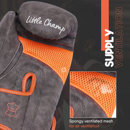 Close-up of Little Champ kids boxing glove showing breathable mesh ventilation system, orange airflow panel, and protective design for young boxers.