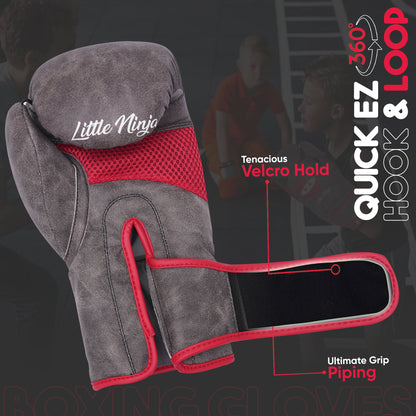 Grey and red Little Ninja youth boxing gloves with adjustable Velcro strap, ergonomic wrist support, and breathable mesh design for children's boxing practice.