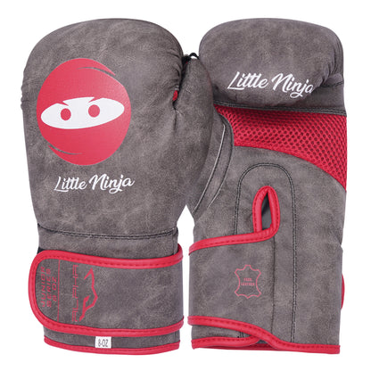 Grey and red Little Ninja youth boxing gloves with ergonomic fit, strong wrist protection, breathable mesh panel, and comfortable training design for children.
